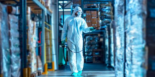 Biocides being sprayed in a storage warehouse.